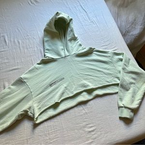 Pangaia light green cropped raw hem hoodie sweater